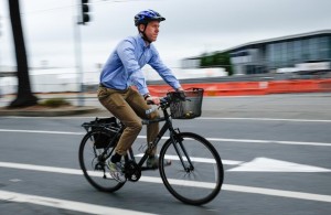 Bicyclist riding in the bike lane. Link to Bicycle Safety Projects page on SFMTA's website.